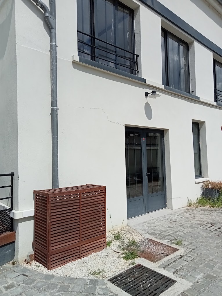 Cache groupe extérieur climatisation esthétique intégration Île-de-France La Maison De La Clim